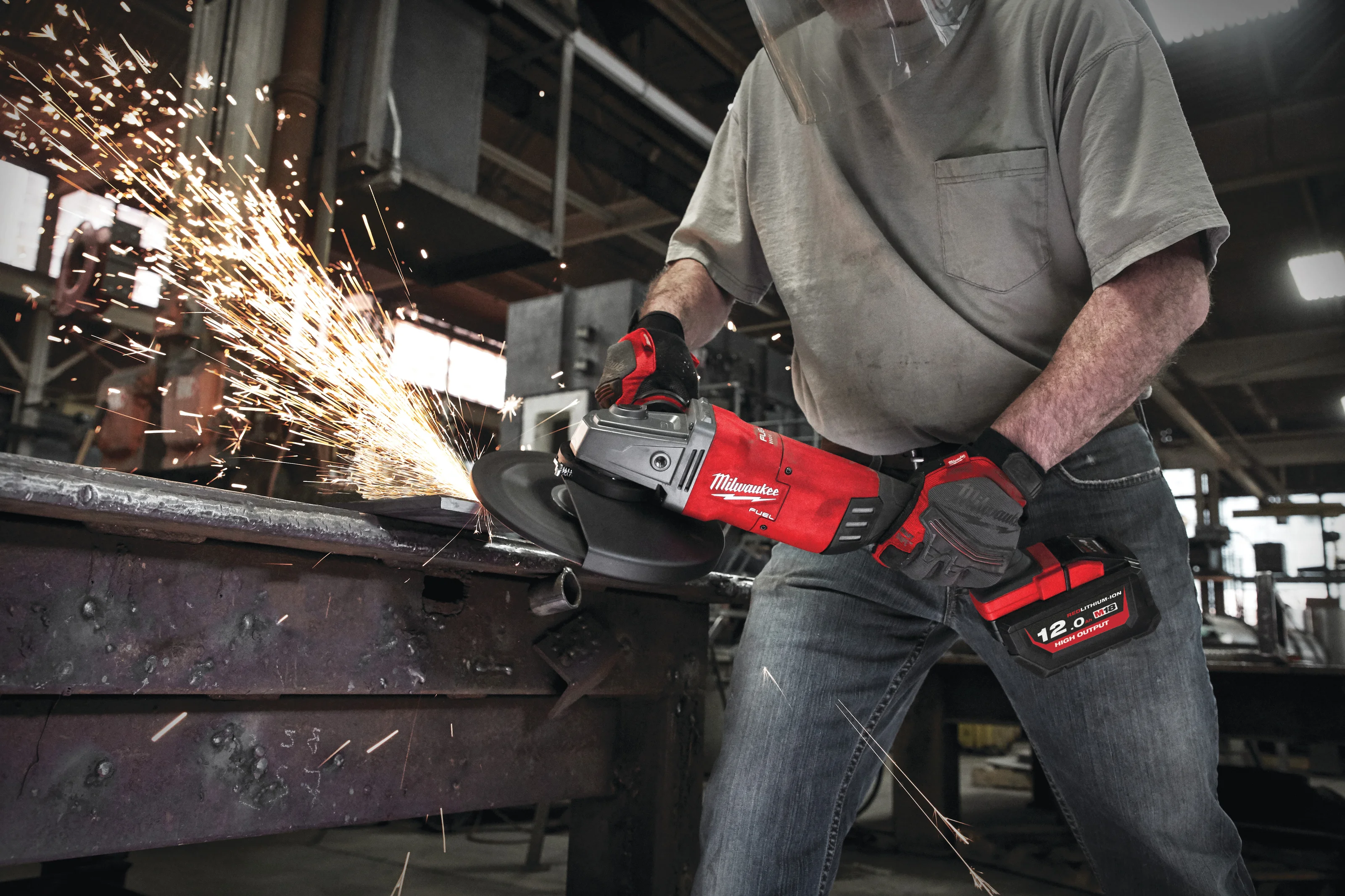M18 FLAG230XPDB FUEL 230 mm Grinder in use on the job