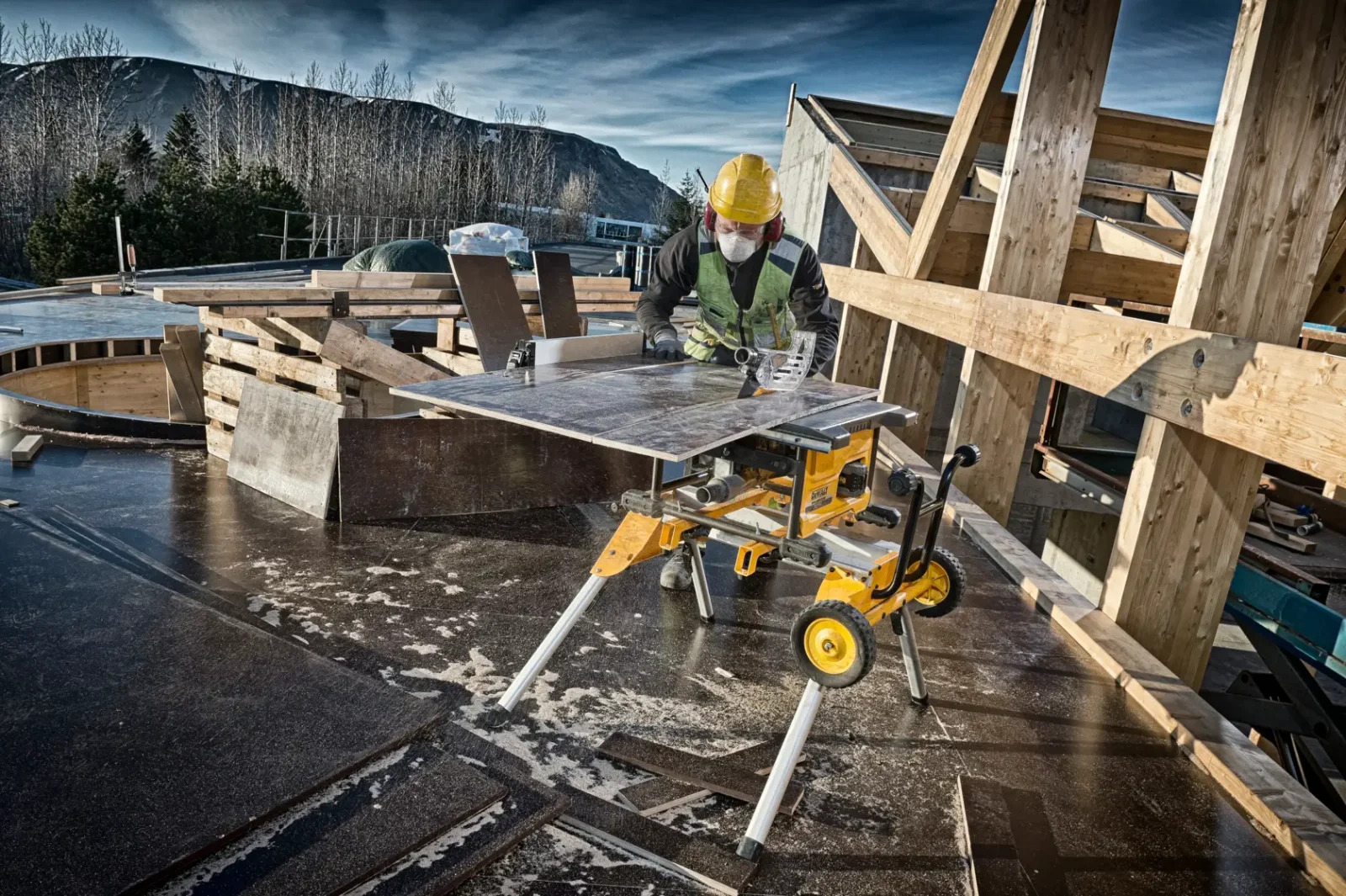 DeWalt DCS7485 table saw in use on site