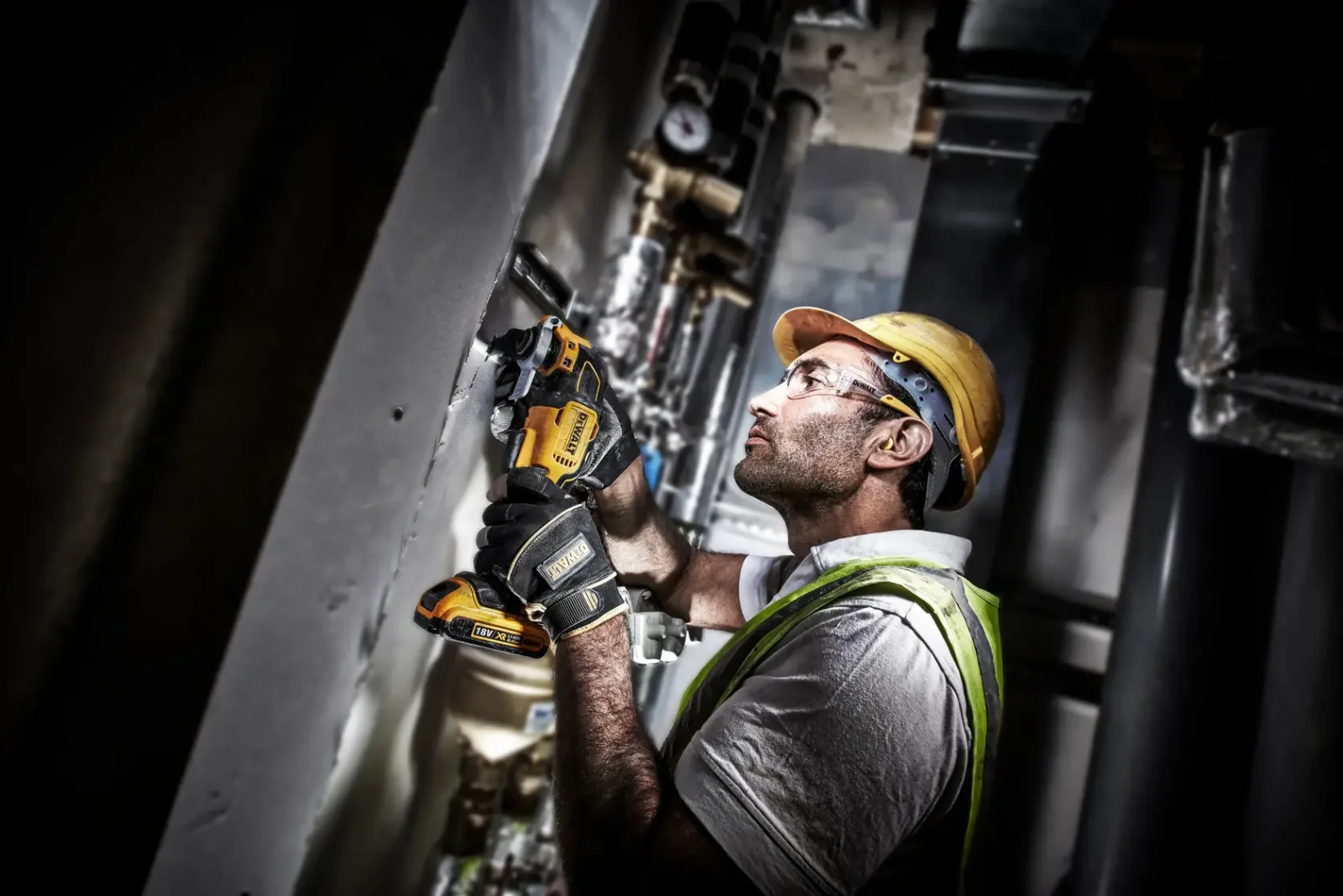 DeWalt DCS356 multi-tool in use on site