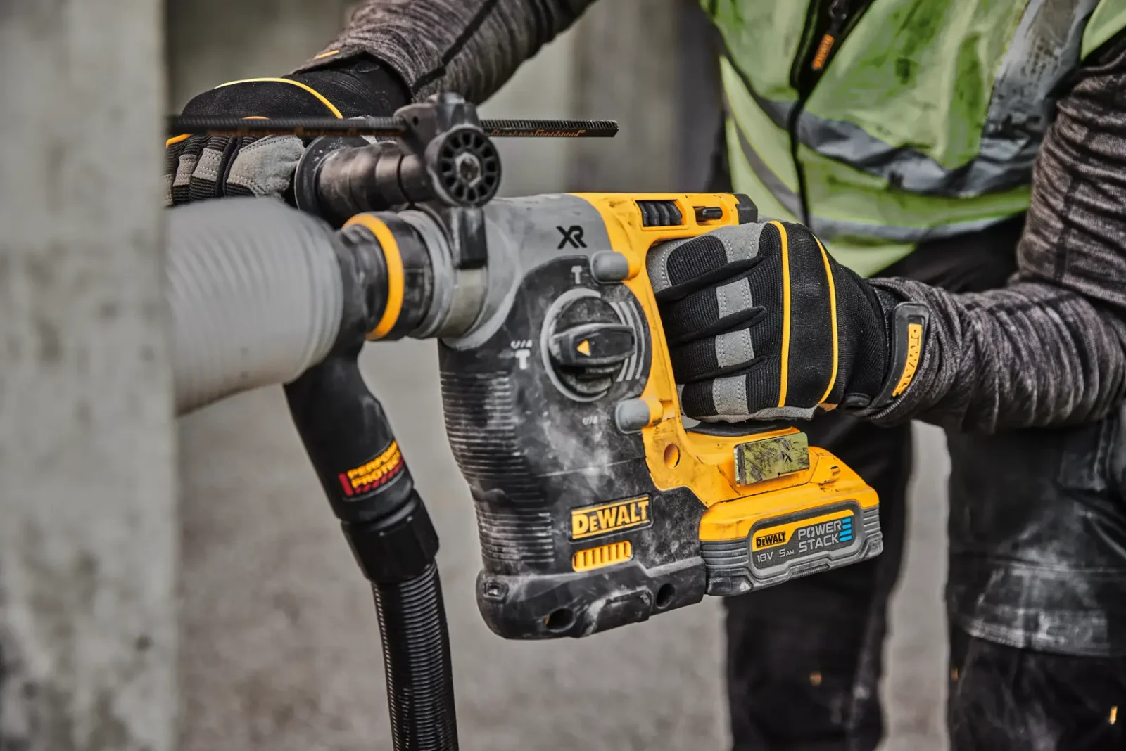 DeWalt DCH273 SDS-plus hammer drill in use on site