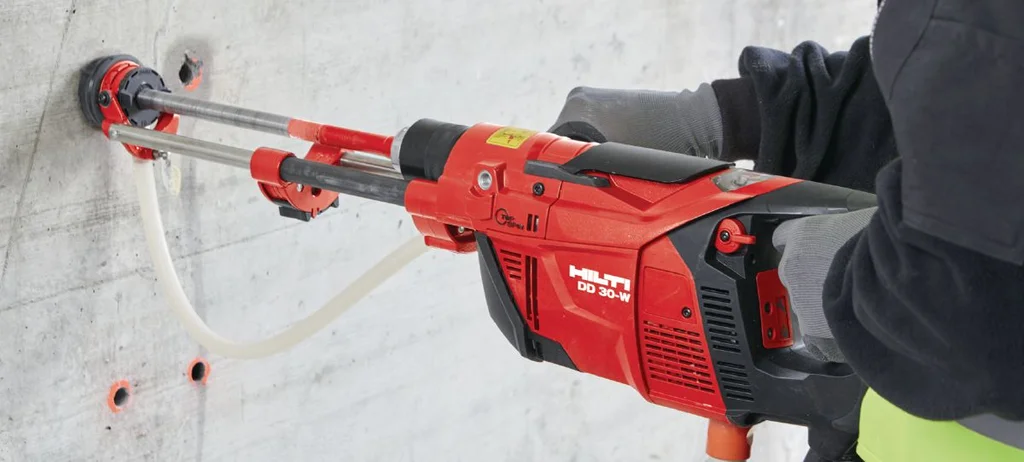 Installer wet-coring an anchor hole with the Hilti DD 30-W