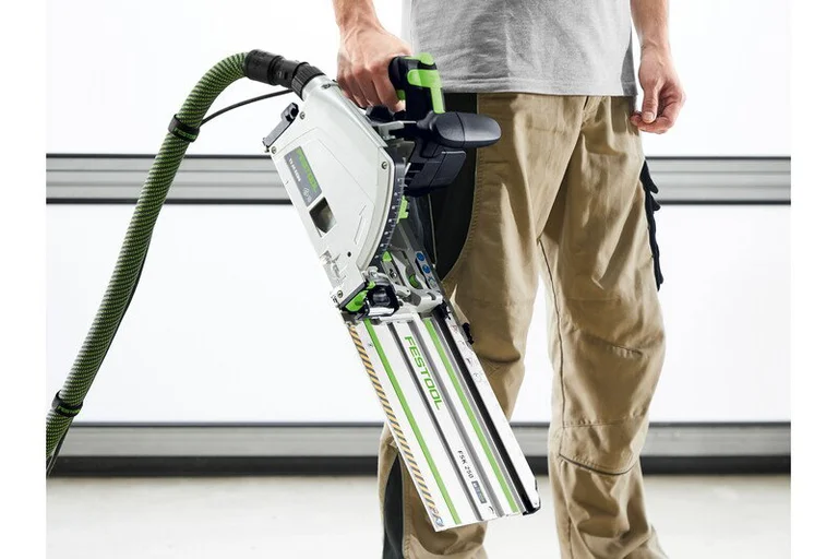 Festool TS 60 K carried with an FSK cross-cutting rail attached