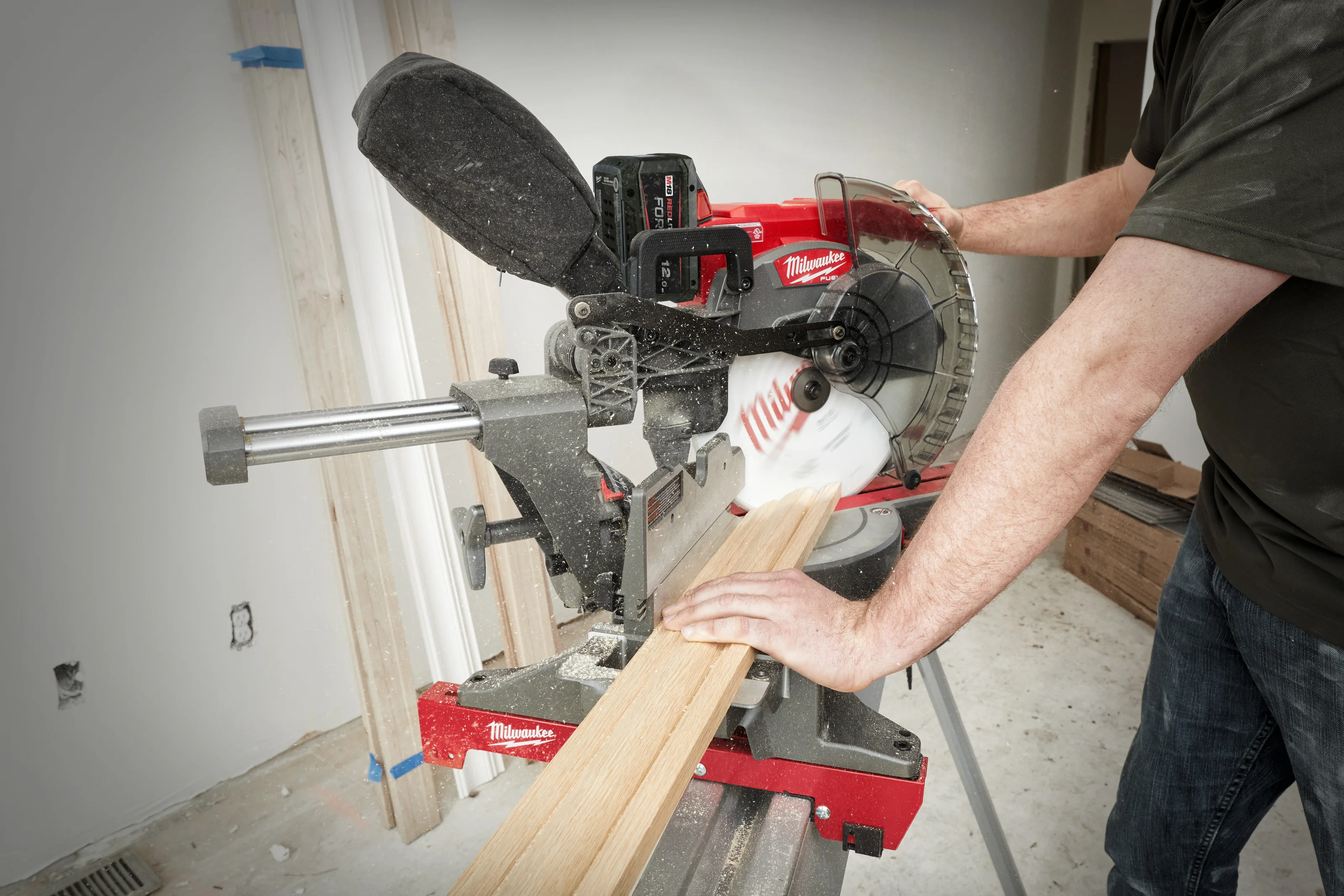 M18 FMS305 FUEL 305 mm Mitre Saw in use on the job