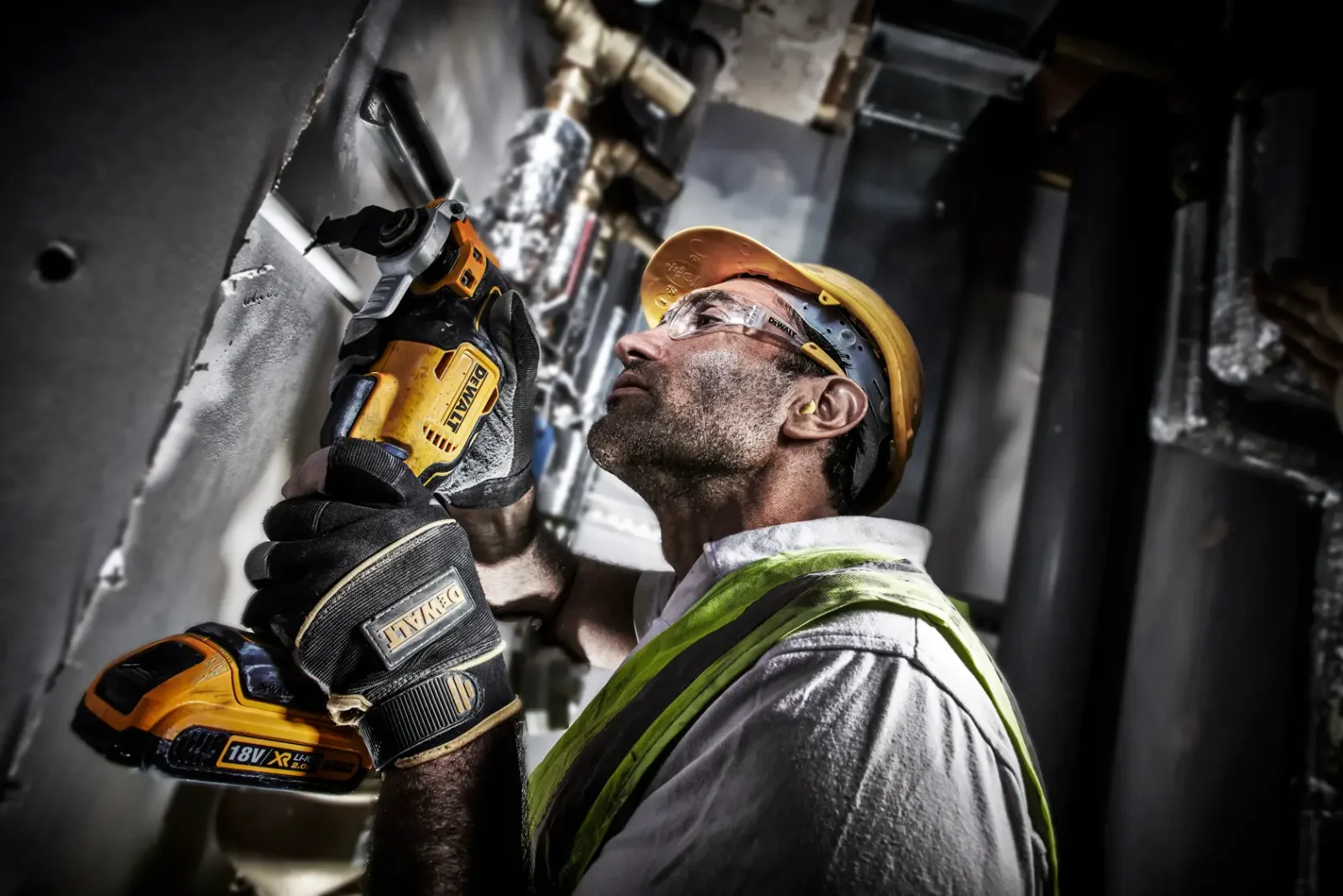 DeWalt DCS356 multi-tool in use on site