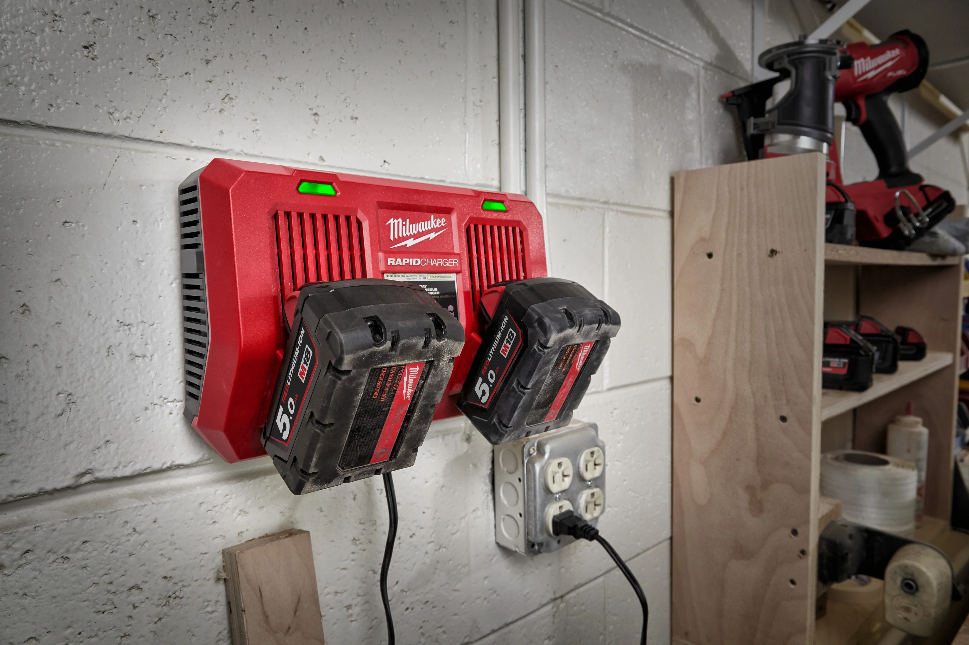 M18 DFC Dual Bay Rapid Charger in use on the job