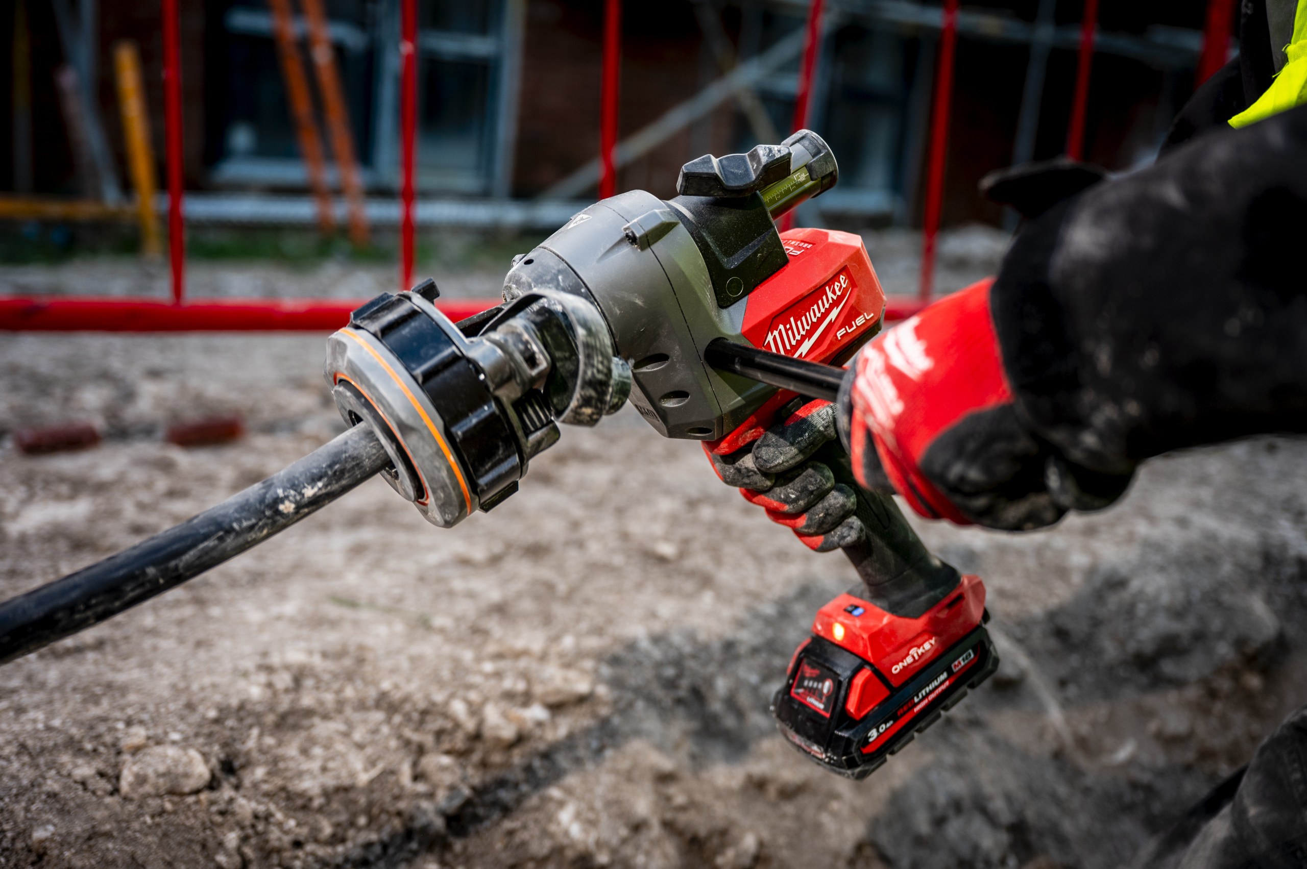 M18 FCST FUEL Cable Stripping Tool in use on the job