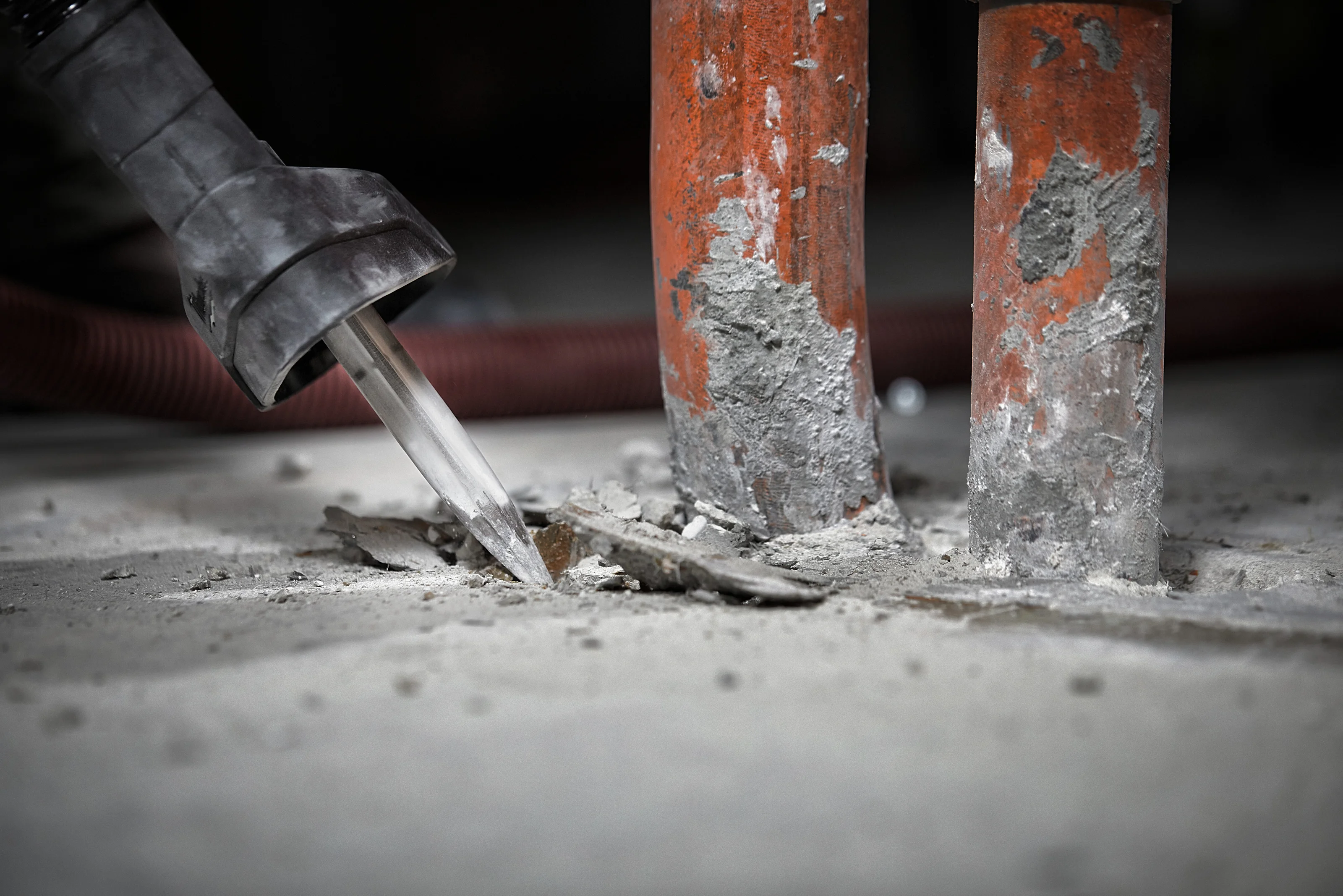 SDS-max chisel breaking concrete