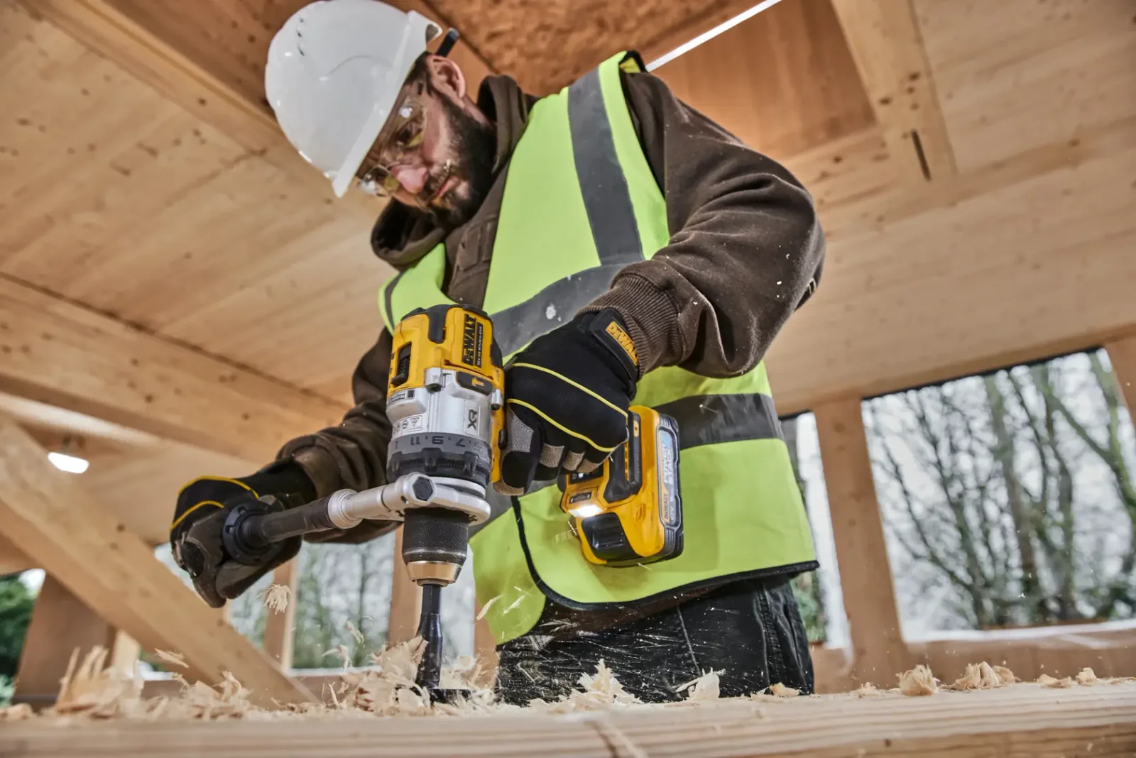 DeWalt DCD1007 hammer drill driver in use on site