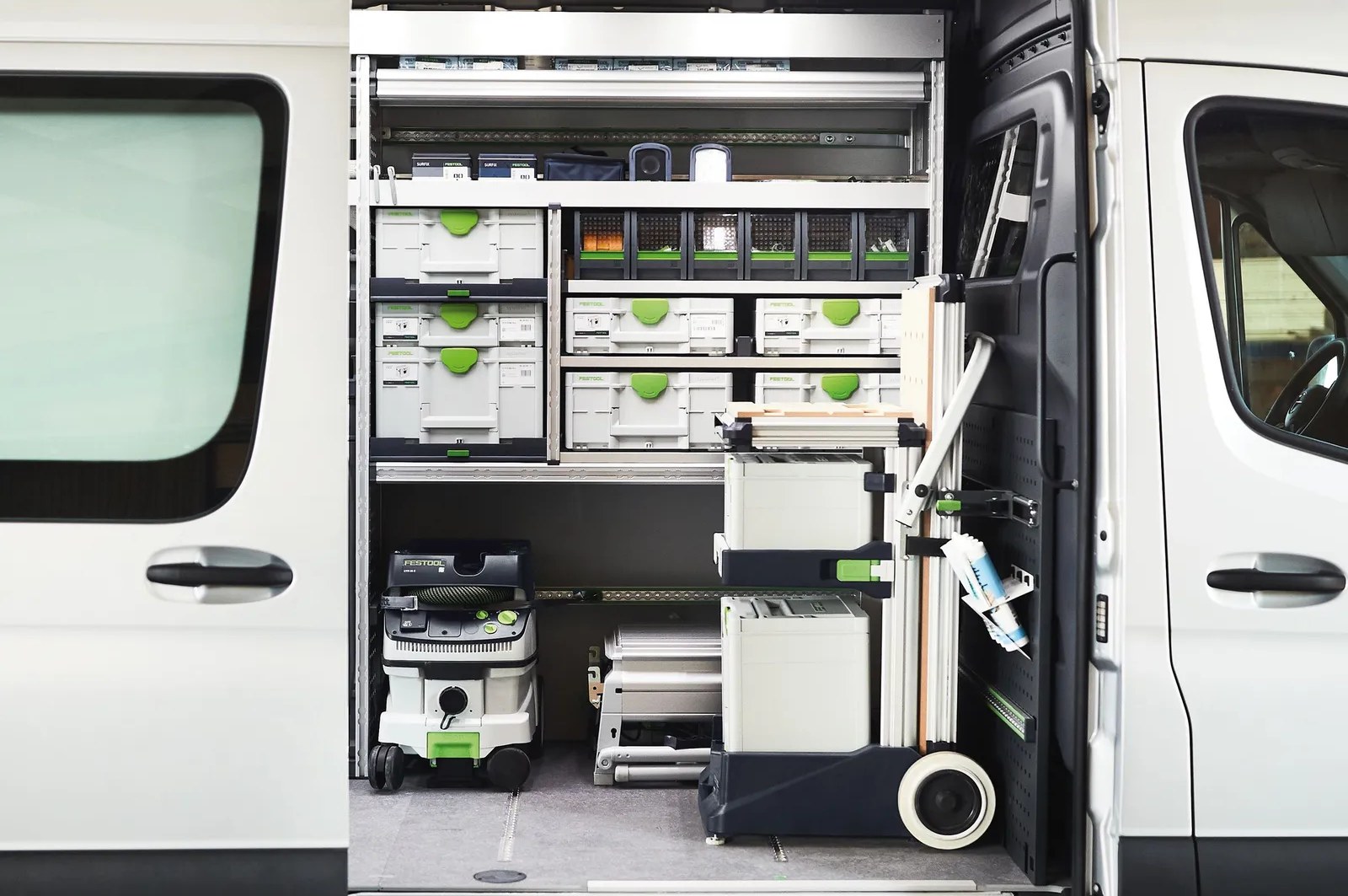 Van racking loaded with Festool Systainers