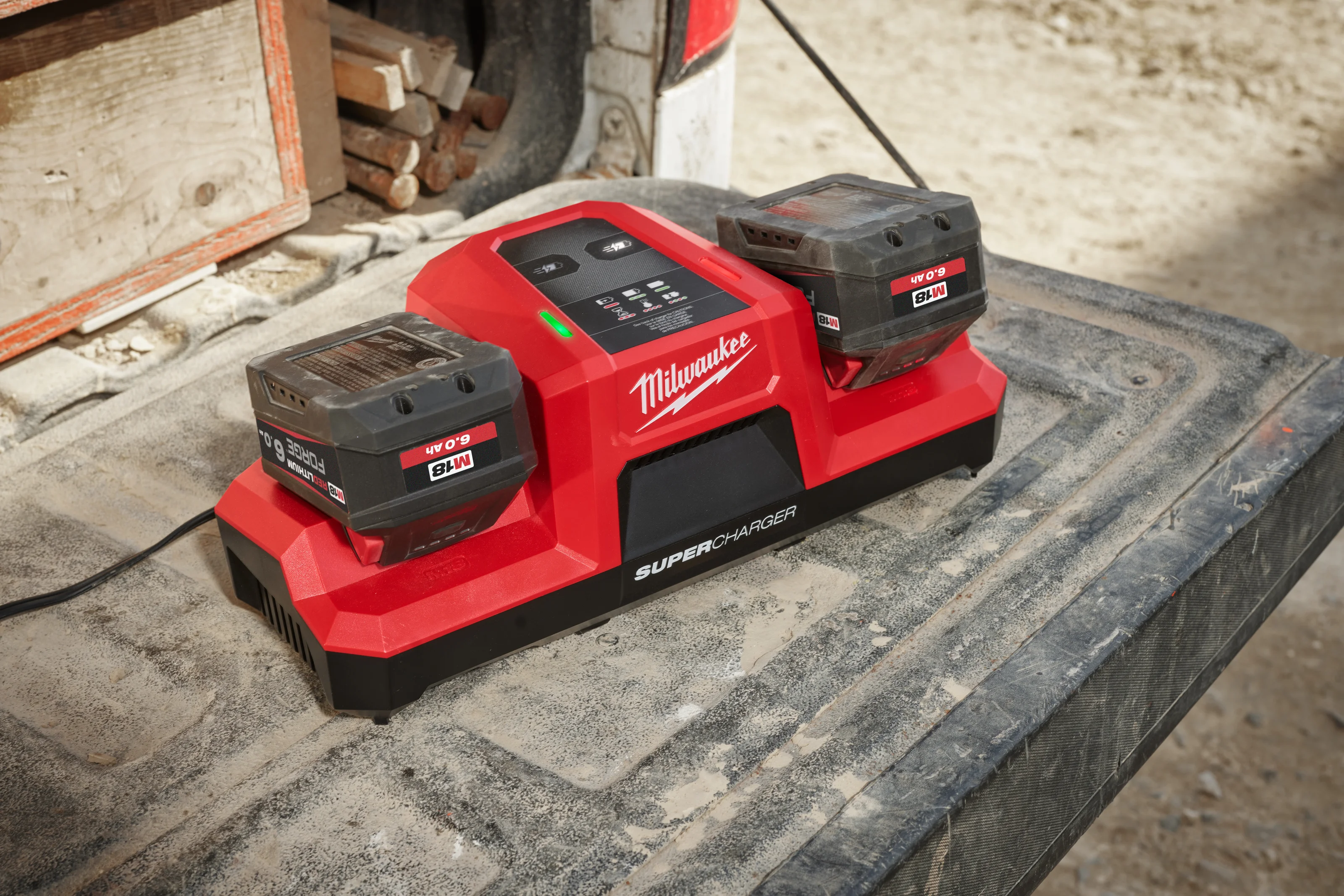 M18 DBSC Dual Bay Super Charger in use on the job