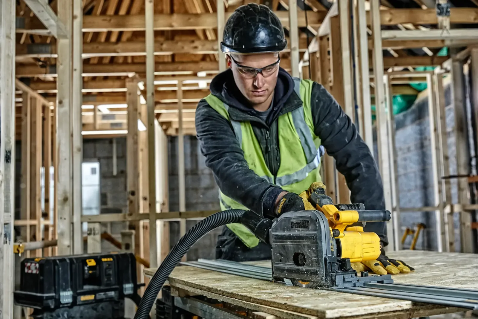 DeWalt DCS520 plunge saw in use on site