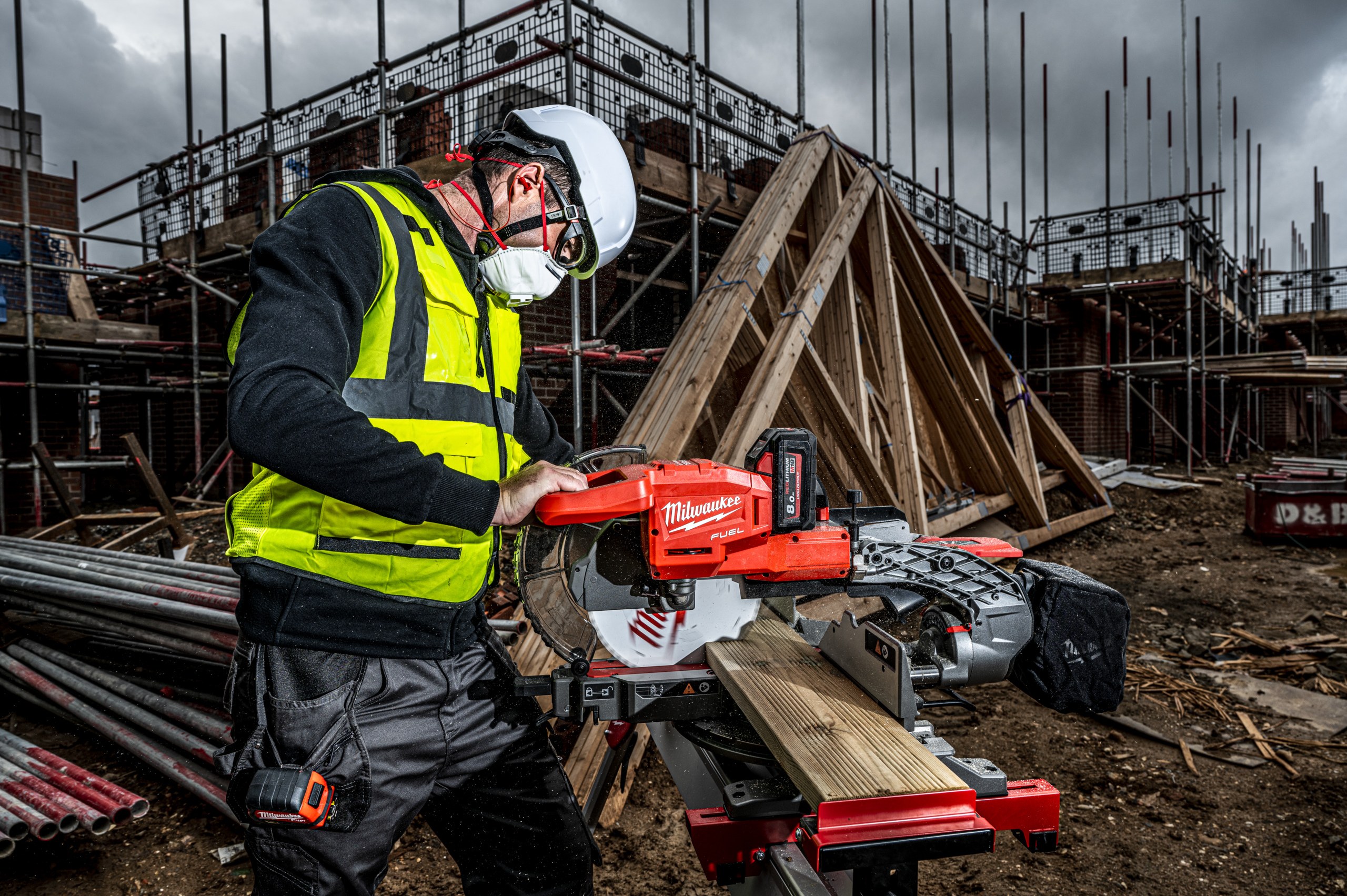 M18 FMS254 FUEL 254 mm Mitre Saw in use on the job