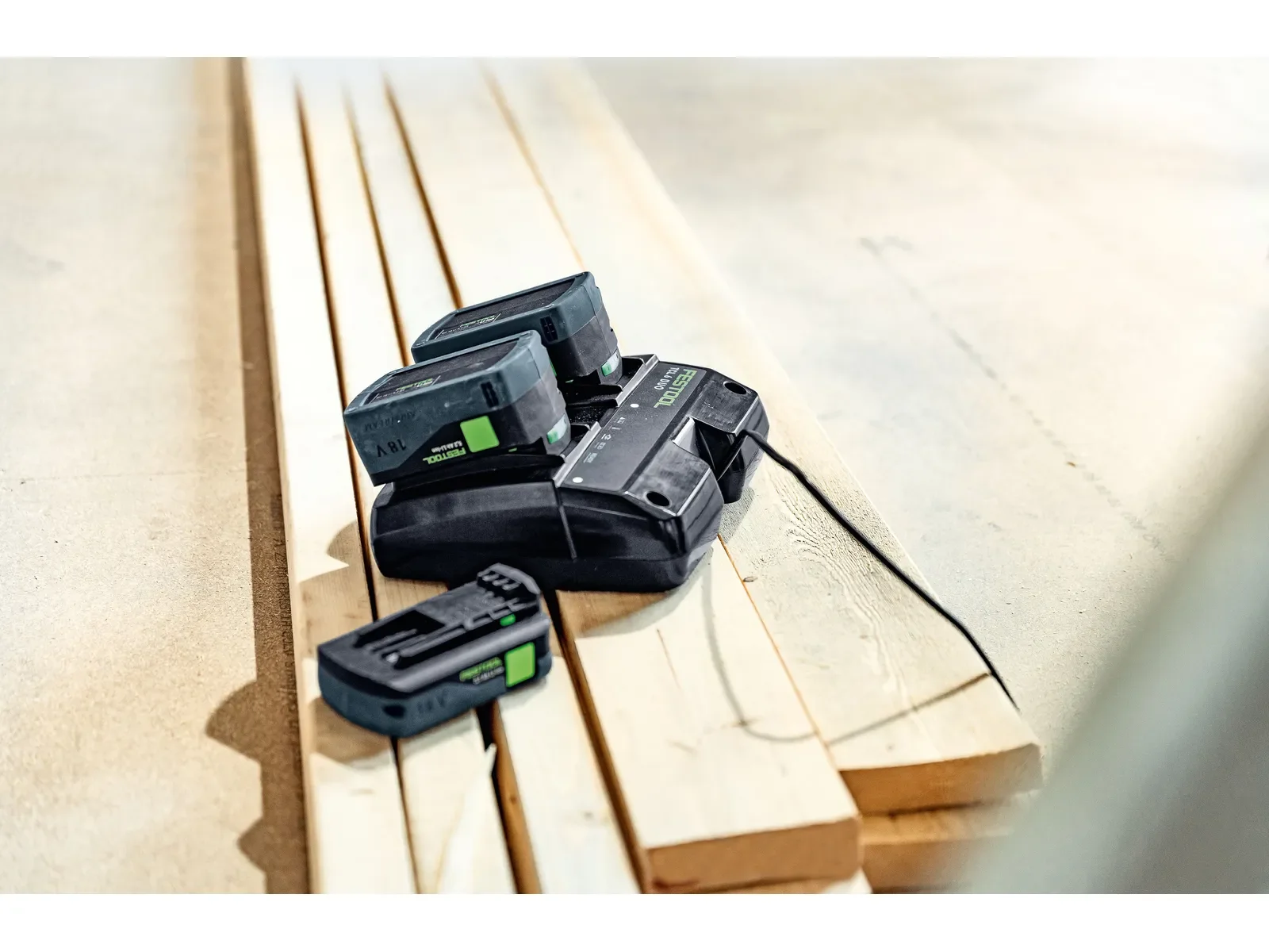 TCL 6 DUO charging on timber boards on site