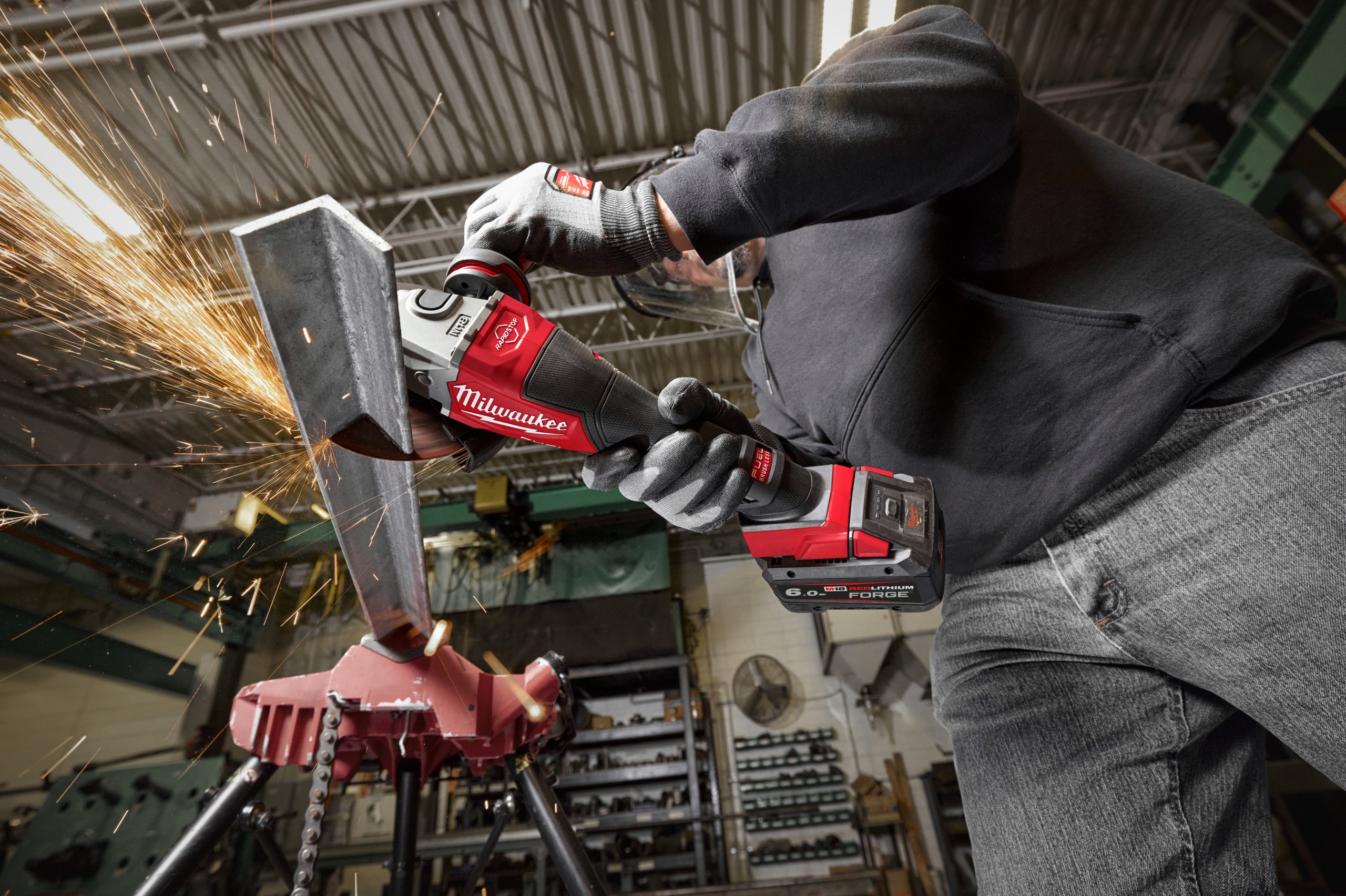 M18 FHSAG125XPDB2 FUEL 125 mm Braking Grinder with Paddle Switch in use on the job