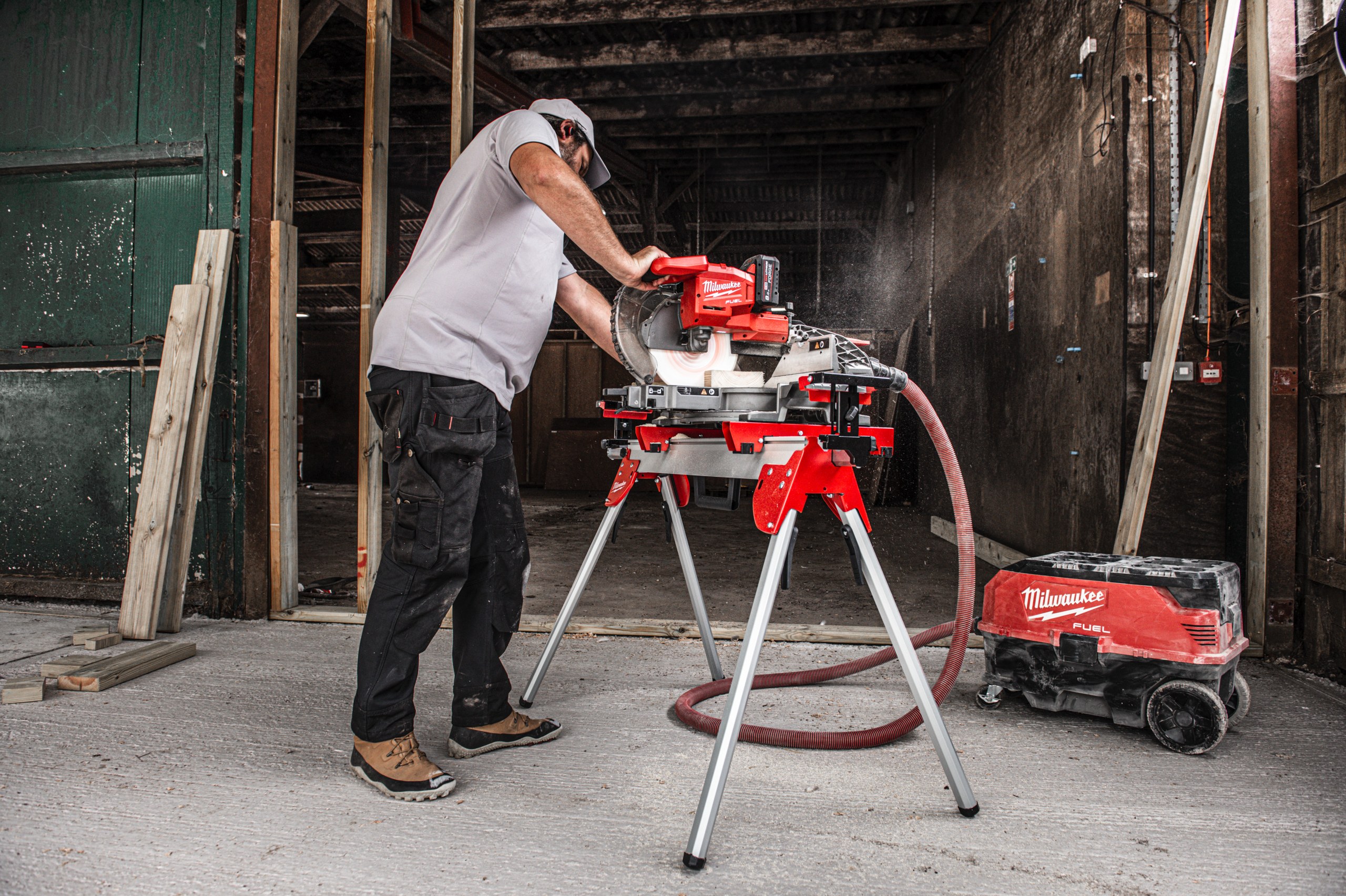 M18 FMS254 FUEL 254 mm Mitre Saw in use on the job