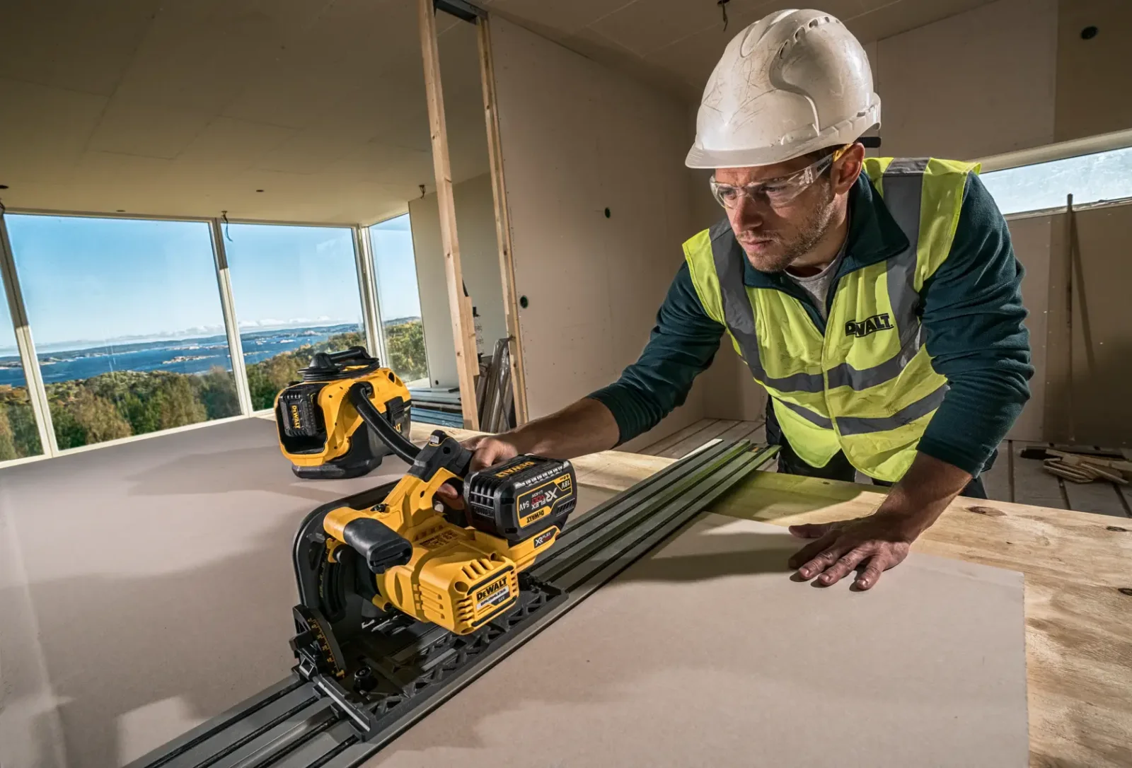 DeWalt DCS520 plunge saw in use on site
