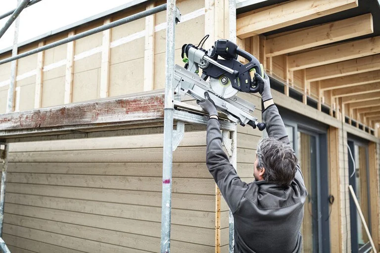 Festool KAPEX KS 60 handed up onto a scaffold