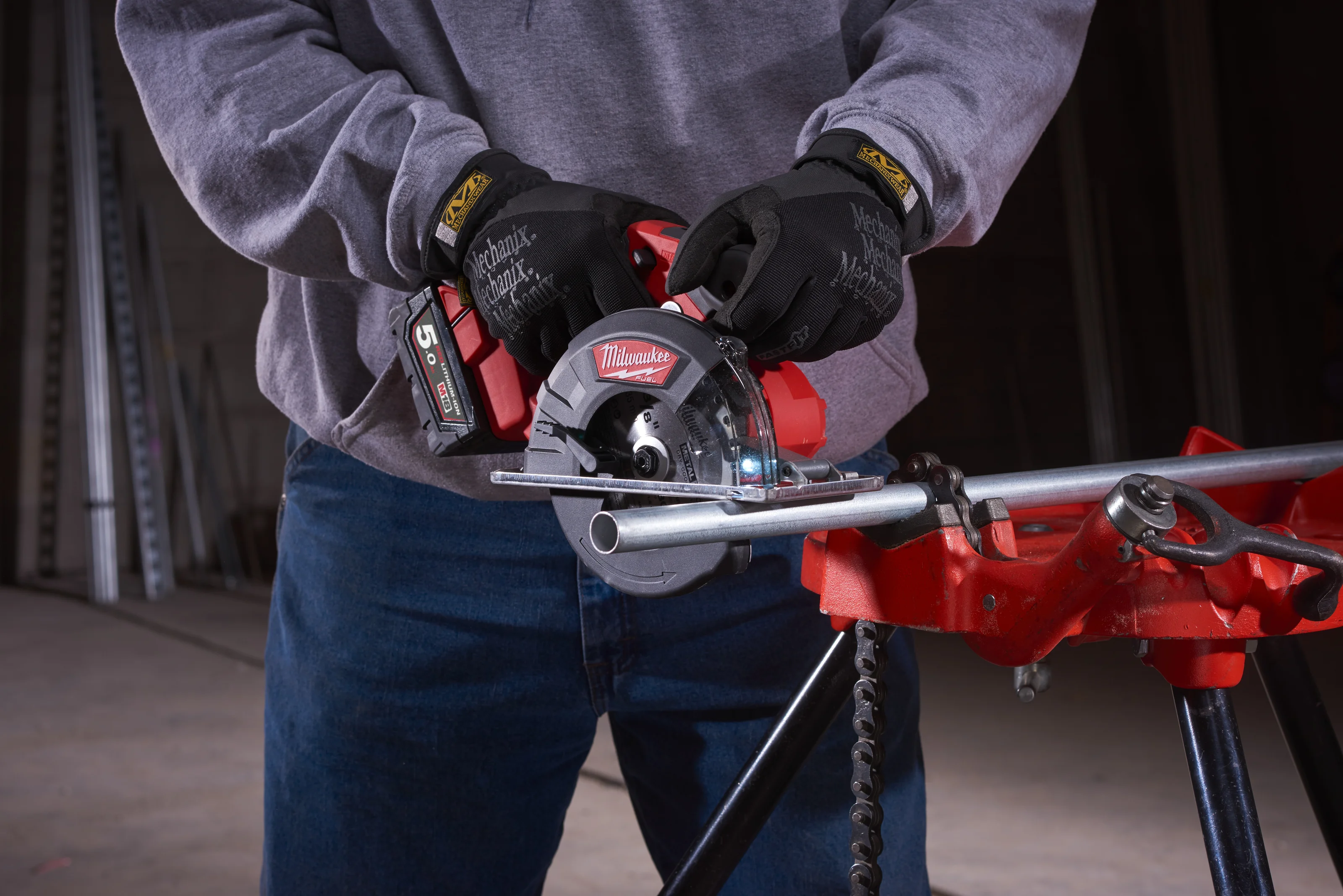 M18 FMCS FUEL Metal Circular Saw in use on the job